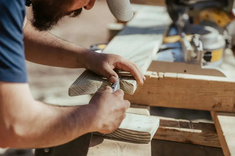 Planing the edge of an oak board at a work bench