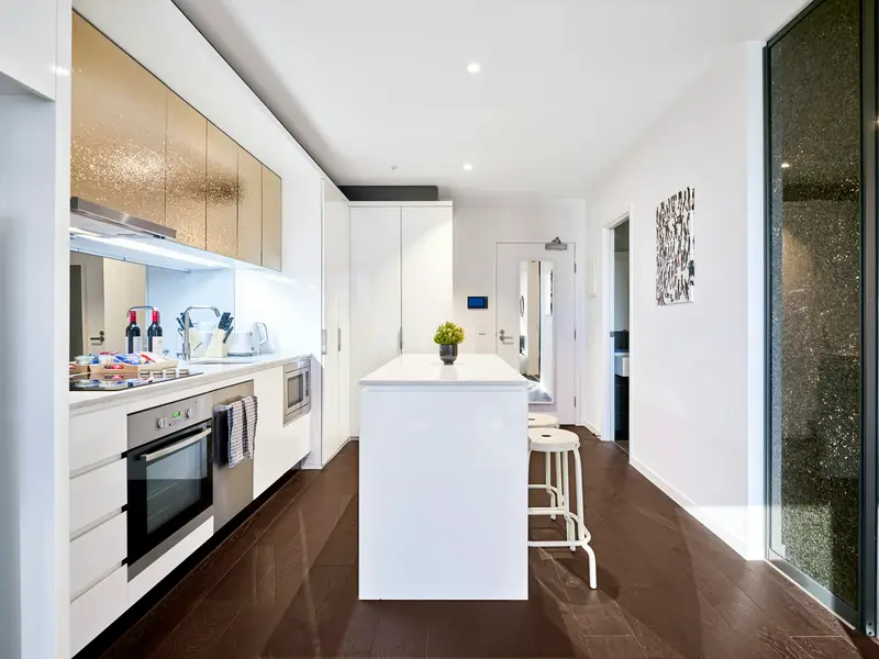White kitchen with new light oak plank floor