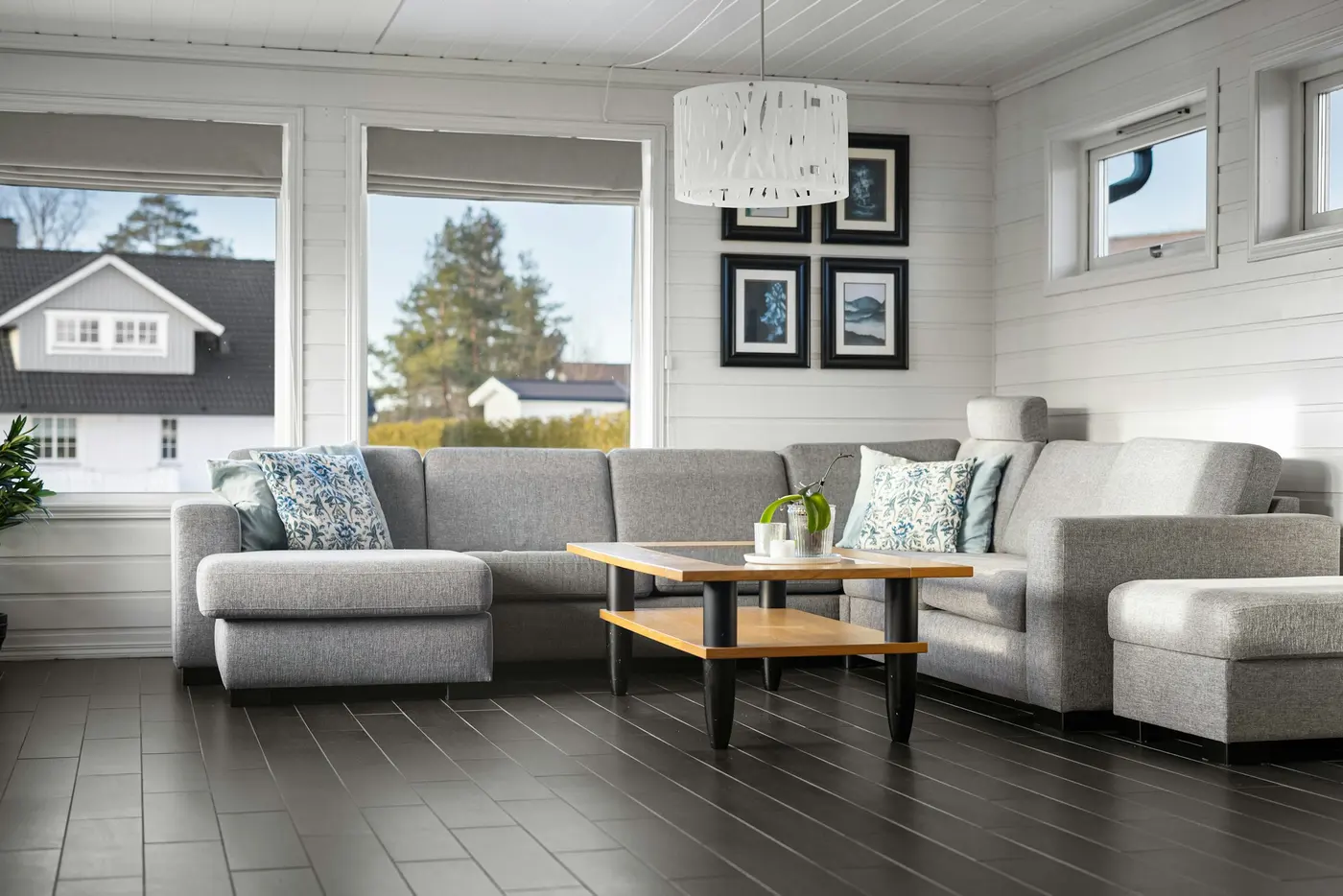 Dark oak-look luxury vinyl plank in a family room