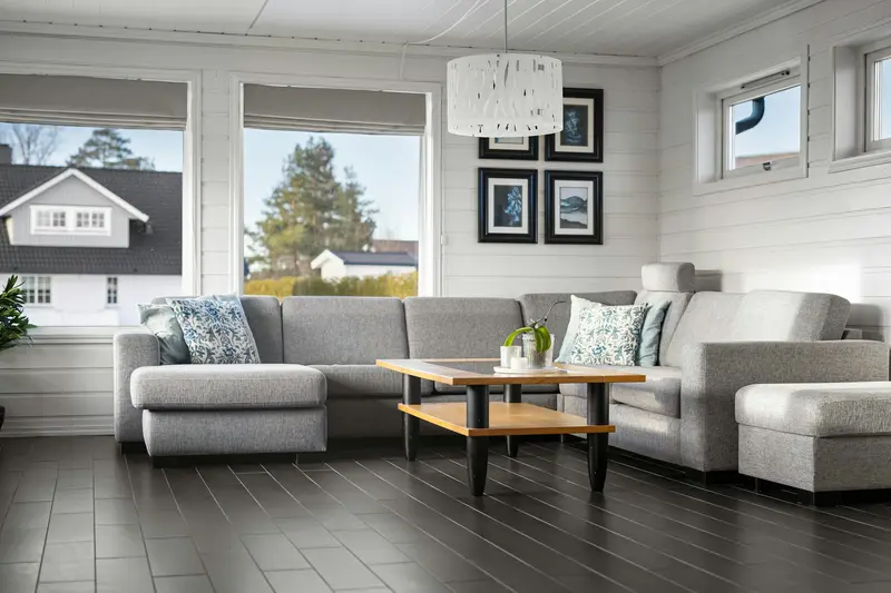 Dark luxury vinyl plank floor in a family room